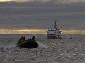 Small boat leaving ship